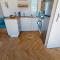 BJ Chalets - De Rug 3 - Vakantiepark Lauwersoog - Luxe chalet MET vaatwasser en inloopkast! Vroege incheck! MET AIRCO! - Lauwersoog