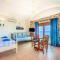 Plaka Beach Cottages