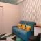 Anne and Gie 1 BR Condo Unit with kitchenette in Trees Residences SMDC - 马尼拉