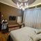 LUXURIOUS ACCOMMODATION IN 2BR APARTMENT, IN A SECURED AREA WITH COMFORTABLE DISTANCE TO R/W STATION, AIRPORT AND CITY CENTER.