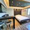 Burgundy McKinley Place Service Apartment
