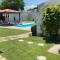 Casa aconchegante com piscina e muito espaço verde