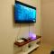 Anne and Gie 1 BR Condo Unit with kitchenette in Trees Residences SMDC - 马尼拉