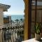 Cal SalMaré seafront apartment with rooftop terrace and pool