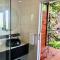 Sky: rainforest and ocean views with jacuzzi
