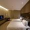 Foto: The Mulian Hotel Guangzhou Zhujiang New Town 26/49