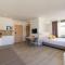 Atenea Park Suites & Apartments