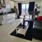 Sheryll Escapes - Kandi Tower 3 premium loft 1BR on 8th floor with 2CR & 2 balconies