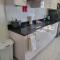 Sheryll Escapes - Kandi Tower 3 premium loft 1BR on 8th floor with 2CR & 2 balconies