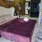 Sheryll Escapes - Kandi Tower 3 premium loft 1BR on 8th floor with 2CR & 2 balconies