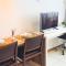 Quarto Executivo para Sua Estadia de Trabalho