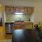 Poolside King Cabana with full kitchen, king bed, sleeper sofa and pool access, Hotel Room