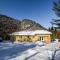 Tranquil Riverfront Chalet with Hot Tub
