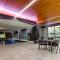 2BR CBD pad, city views, free parking, pool, gym