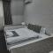 Many apartments and hotel-type rooms in the Tatto studio building are located on Nizami Street