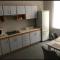 Many apartments and hotel-type rooms in the Tatto studio building are located on Nizami Street