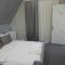 Many apartments and hotel-type rooms in the Tatto studio building are located on Nizami Street