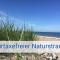STRANDLIEBE 100 qm Gartenwohnung (eingezäunt), 15 Gehminuten zum Strand - Neukirchen