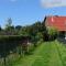 Ferienhaus im urigen Garten bzw Eulenhaus