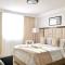 Attractive studio with Luxury bed Good for 1-4pax High speed WiFi with Netflix Free Pool & Parking
