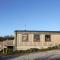 Spacious cabin on isolated farm with sea view
