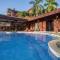 Spacious 4BR Condo with Partial Ocean View - Bougainvillea - Reserva Conchal