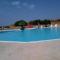 Ampio trilocale climatizzato in Villaggio con piscina estiva 400m dal mare in Gallura