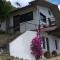 Detached house with garden and sea view