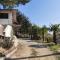 Detached house with garden and sea view