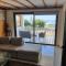 JOANNA SUNSET APTS Pomos