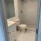 bedroom with sharing bathroom