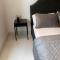bedroom with sharing bathroom