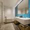 Qingdao Oriental Studio Chuangzhi SSAW Hotel - تشينغداو