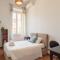 The Best Rent - Colourful two-bedroom apartment near Termini Station