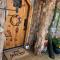 Hobbit Treehouse with waterfall on the Brazos River! 350 acres! Tubing! Petting zoo!
