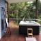 Sky: rainforest and ocean views with jacuzzi