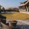 Bel Air Mansion by StayVista - A tranquil oasis with a spacious deck, Gazebo, Sauna, Jacuzzi & A mini-amphitheatre