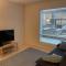 Modern 1 bedroom apartment with a patio