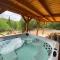 Chalet bois rond aux paysages uniques avec Spa !