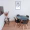 Appartement cosy dans une maison calme et parking gratuit avec borne