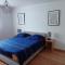 Appartement cosy dans une maison calme et parking gratuit avec borne - إلكيرك كرافونستاد