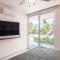 Ground level Garden condo at Akumal south by TAO Santamar