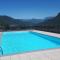 Appartamento IL GELSOMINO con giardino e piscina