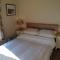 Foto: Sandycove House Bed & Breakfast 10/25