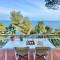 Cokkinis villa with garden overlooking the sea