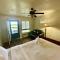 Lake view queen Guest Room with two queens, sleeper sofa and deck overlooking Lake Ouachita, Hotel Room