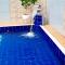 Casa com piscina e Wi Fi em Mongagua SP - Praia Grande