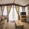 Modern Caravan At Caldecott Hall With Decking In Norfolk, Sleeps 8 Ref 91068C