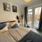 Stylish 4 Bedroom House with Private Parking and Free WiFi in Milton Keynes by HP Accommodation - Milton Keynes