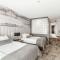 Atheneum Suite Hotel